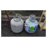 Two Propane Tanks with some gas in each