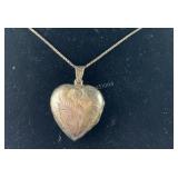 Sterling silver and puffy heart locket necklace