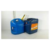 Two 5 gallon kerosene containers.
