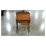 Fall front desk, center brace is present but not