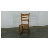 Woven reed seat child