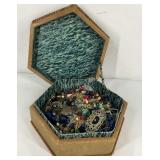 Container with costume jewelry