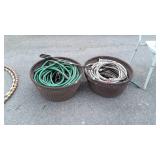 Two Suncast Water Hose Storage Baskets with old