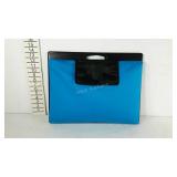 Lap desk with storage pouch and clip board.