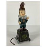 Cast iron Punch 5 cent cigar bank on wheels