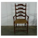 Rush seat captains chair,  finish as shown