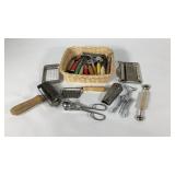 Vintage kitchen utensils including several