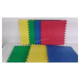 Nine interlocking floor pads, each 24 x 24