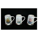 Three ship themed ceramic tankards, 6" tall,