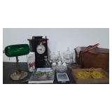 Group: picnic basket, clock with damage, lamps,