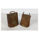 Two rusting cow bells