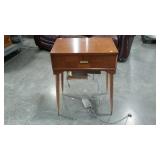 Sewing table with machine, support that holds