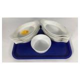 Ten ceramic au gratin dishes, plus a corning