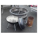 Firepit with grill and fire starter. Note grill