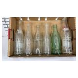 Six soda bottles, Pepsi, Coca-Cola, Cloverdale