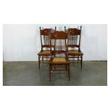 Three spindle back caned seat chairs, lovely