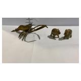 Brass shrimp and two marble elephants