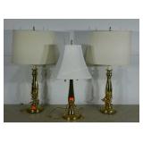 Three brass table lamps. Two are 30" and one is