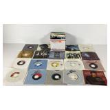 Vinyl records, box of 45 RPMs, most in sleeves,