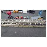 Two Aluminum extension Ladders. Please Note well