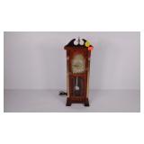 United electric clock, powers on, 20" tall