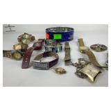 Tin with wrist watches one is running