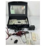 Tattoo machine with supplies