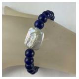 Lapis lazuli white keshi pearl bracelet 88.50ctw