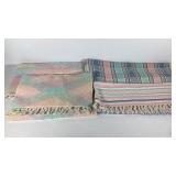 Four pastel scatter rugs