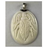 Bali sterling carved bone beetle pendant