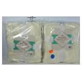 Two Trail Worthy reversible faux fur throws.