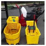 Two Rubbermaid commercial Mop Buckets both with