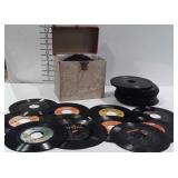 Record keeper and a stack of records,  no covers,