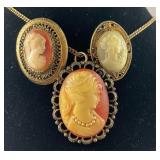 Two cameo brooches and a cameo pendant / brooch