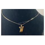 Gold filled "W" pendant on goldtone chain 18in