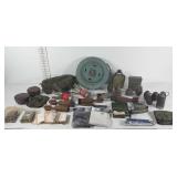 Military gear, grenade shells, land mine casing,