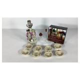 Figural lamp, wine expander and eight baskets