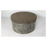 Round tin, marked 25 pounds net weight, 12?