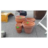 7 terracotta flower pots, one damage others