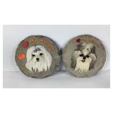 Two dog themed garden stones, 10 inches across