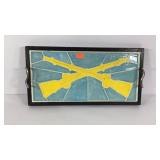 Ceramic mosaic tray with crossed guns design,