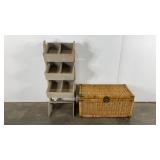 Display stand and a wicker storage chest, but