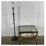 Metal floor lamp without shade, glass topped end