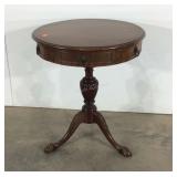 Carved ball and talon accent table, 22" diameter