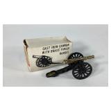Cast iron cannon with brass finish barrel