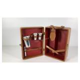 Portable bar case with a few cups and bottle