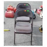 2 brown metal Folding Chairs