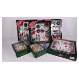 Group of glass hand decorated holiday ornaments,