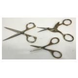 Three sewing scissors