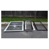 4 Misc House Storm Windows. 2 wood 2 vynil